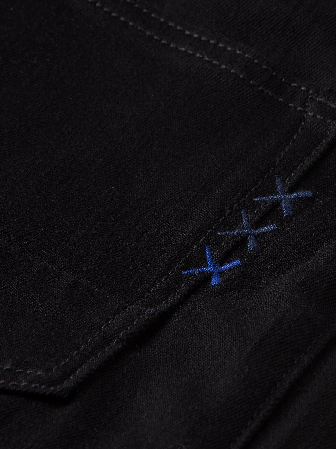 Scotch & Soda Ralston slim-fit denim jeans in dark wash, showing the front view with classic five-pocket style and stitching details.