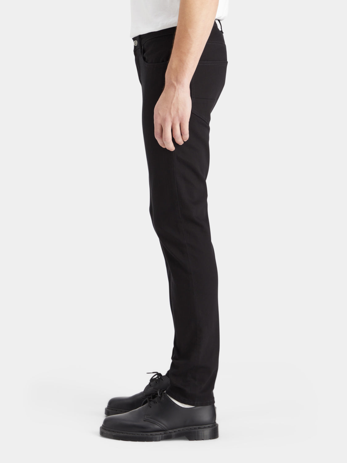 Slim-fit Ralston denim jeans by Scotch & Soda shown on a model, featuring classic five-pocket design and dark wash finish.