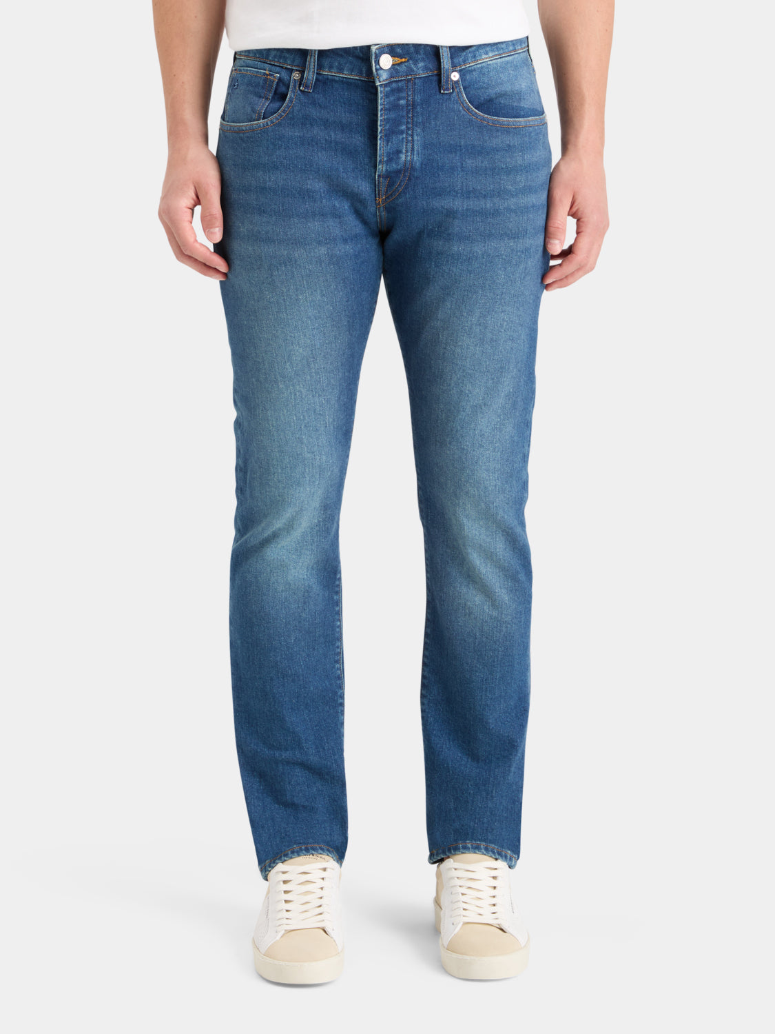 Scotch & Soda Ralston slim-fit denim jeans displayed on a model, showcasing dark wash, classic five-pocket design.