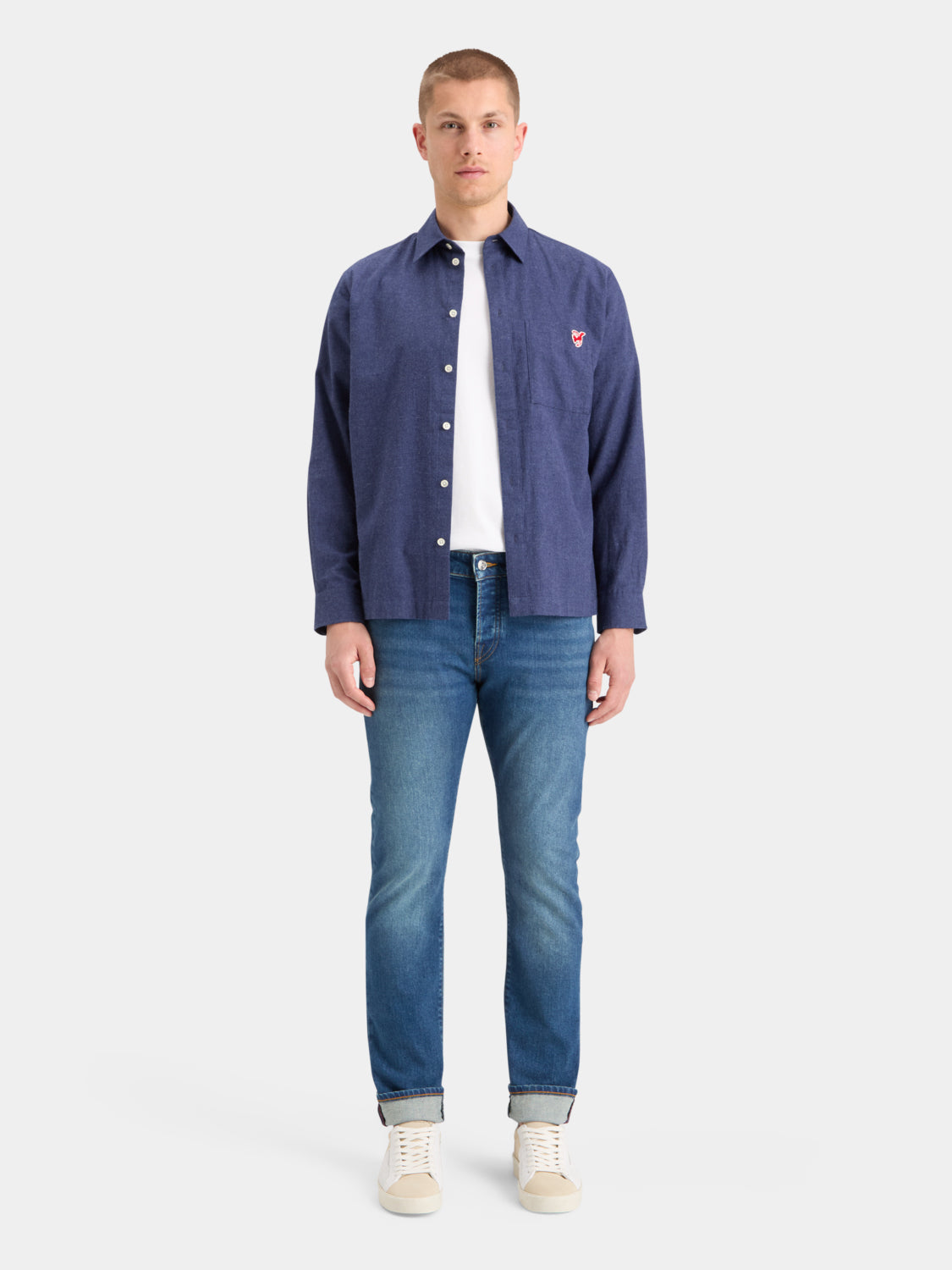 Slim-fit denim jeans by Scotch & Soda, featuring classic five-pocket design and a modern silhouette.