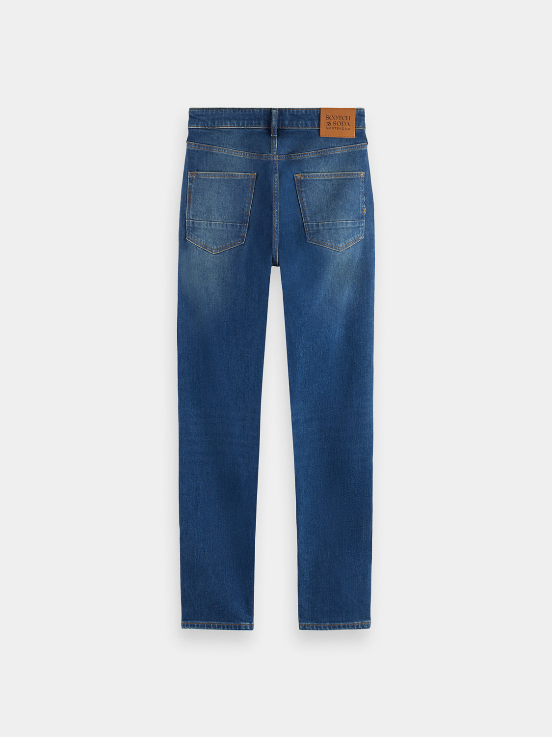 Scotch & Soda Ralston slim-fit denim jeans shown from the back in dark wash with classic five-pocket design.