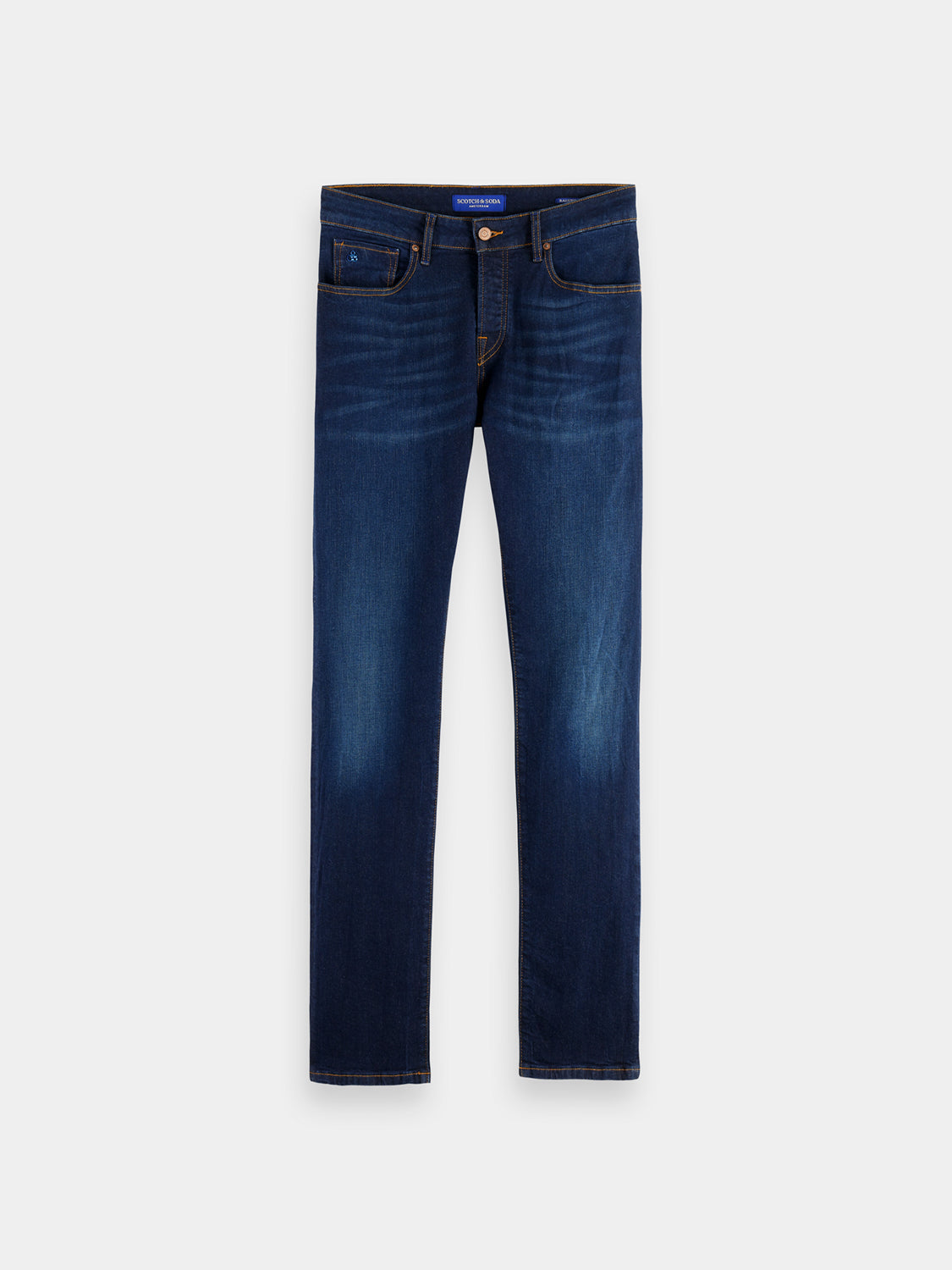 Scotch & Soda Ralston slim-fit denim jeans shown on a model with a classic five-pocket design and dark wash finish.