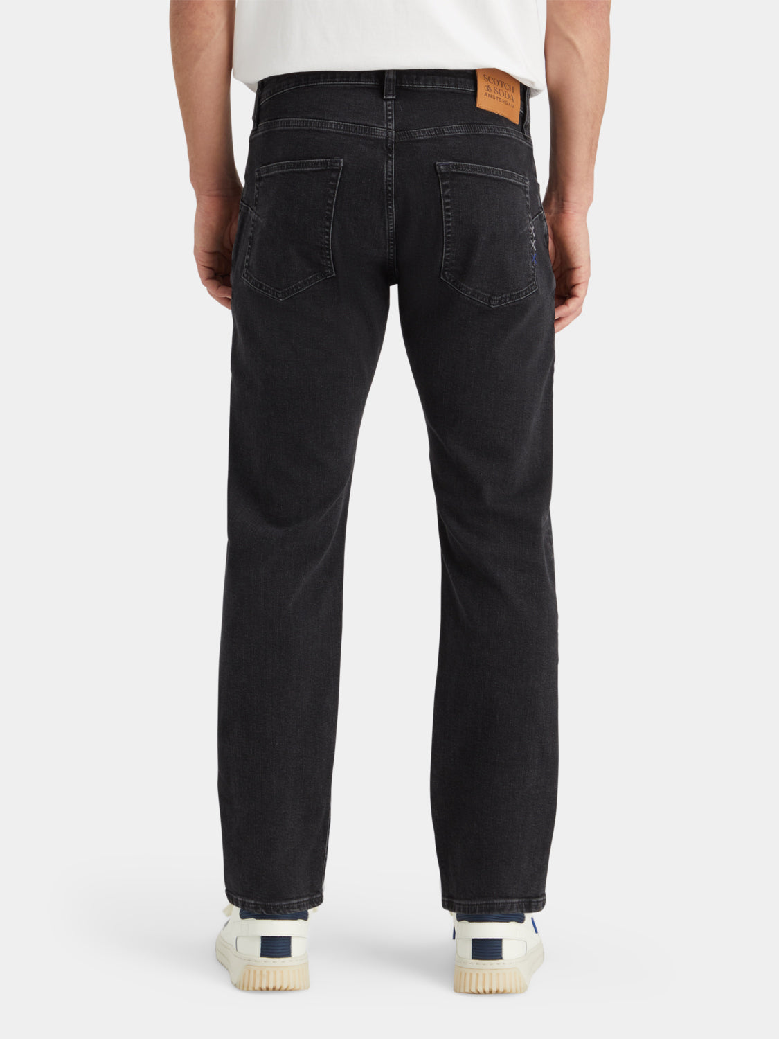 Scotch & Soda Zee straight-fit denim jeans shown from the back, featuring classic five-pocket design and dark wash finish.