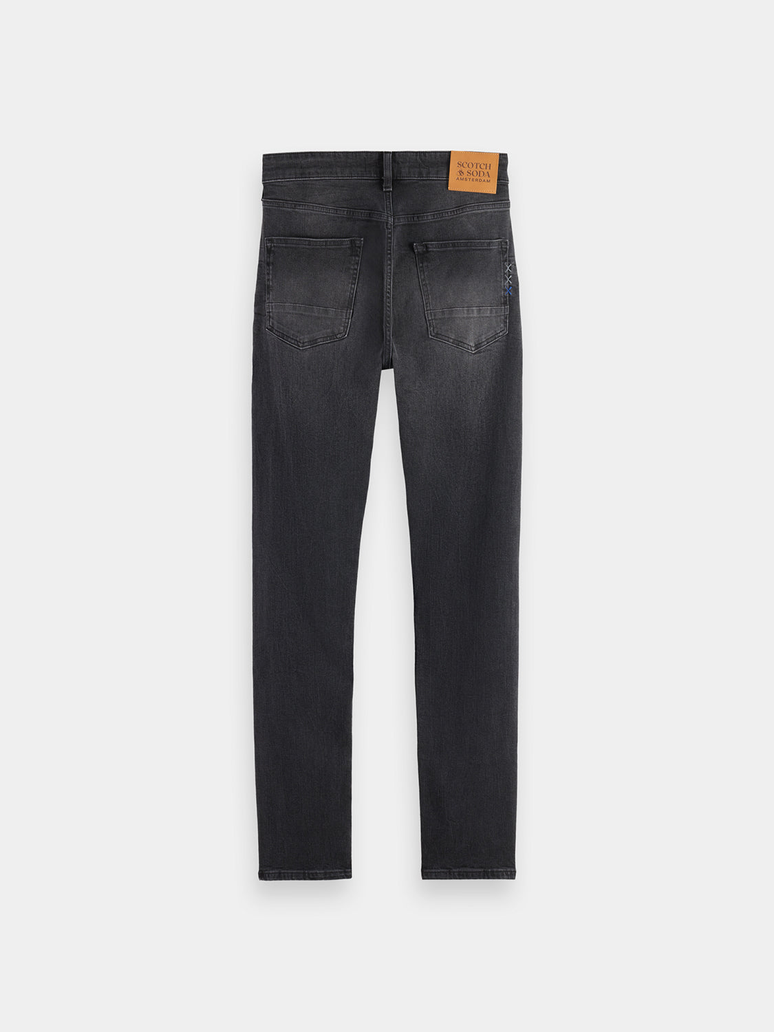 Rear view of Scotch & Soda Ralston slim-fit denim jeans showing dark wash fabric and classic five-pocket design.
