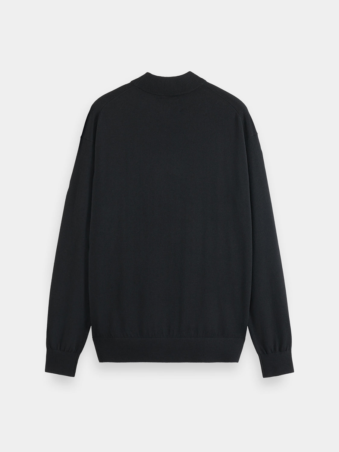Black knit mock neck sweater by Scotch & Soda, close-up of the ribbed collar and soft knit fabric.