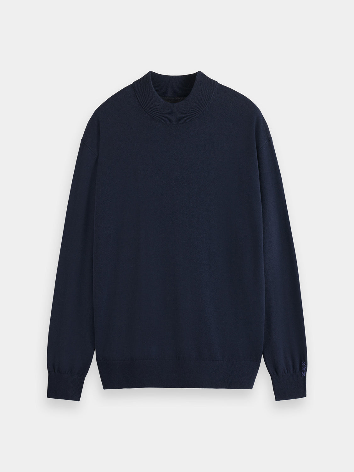 Close-up of a navy knitwear mock neck sweater by Scotch & Soda, showing the textured fabric and high neckline.