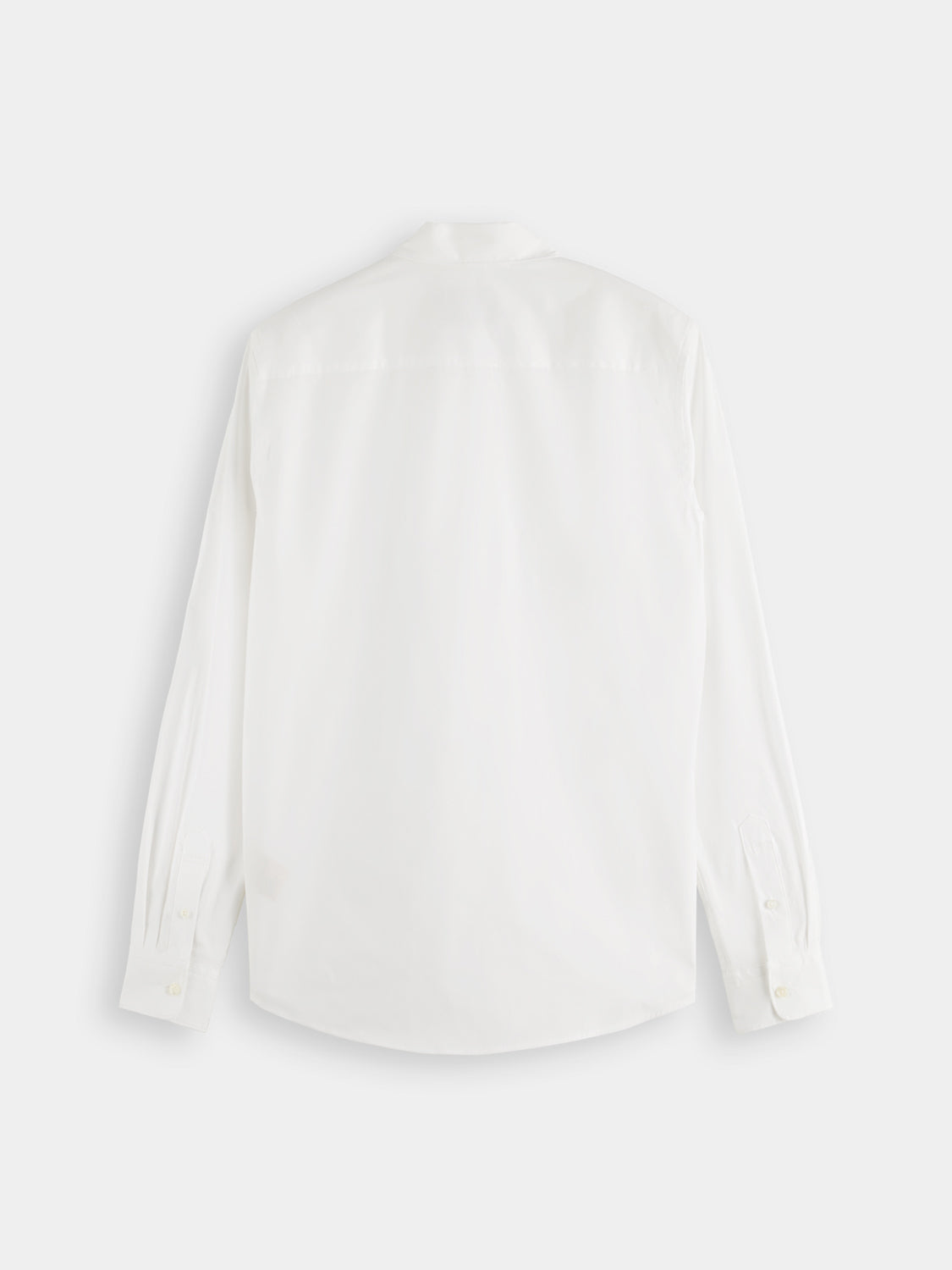 Long sleeve Scotch & Soda poplin shirt in a solid color, shown hanging on a hanger with a button-down front.