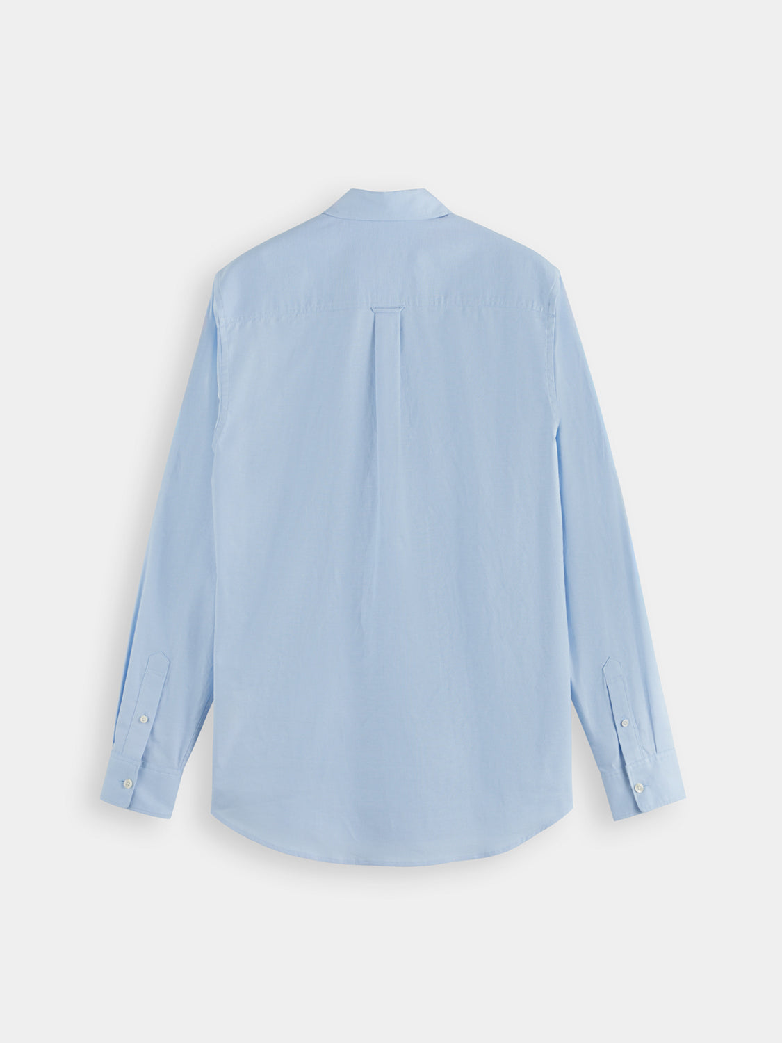 Long-sleeve Scotch & Soda Oxford shirt in classic blue, shown hanging on a wooden hanger with a button-down collar.