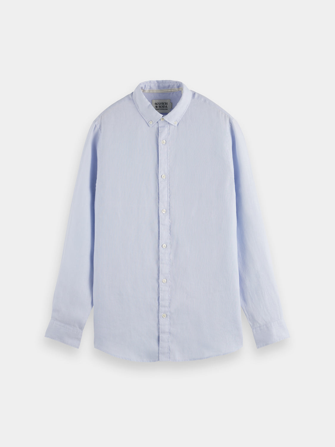 Long-sleeve linen shirt by Scotch & Soda with a relaxed fit, shown in soft beige fabric on a plain background.