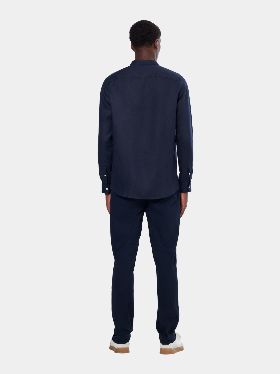 Long sleeve collarless linen shirt by Scotch & Soda, shown from the back with a relaxed fit and soft fabric.