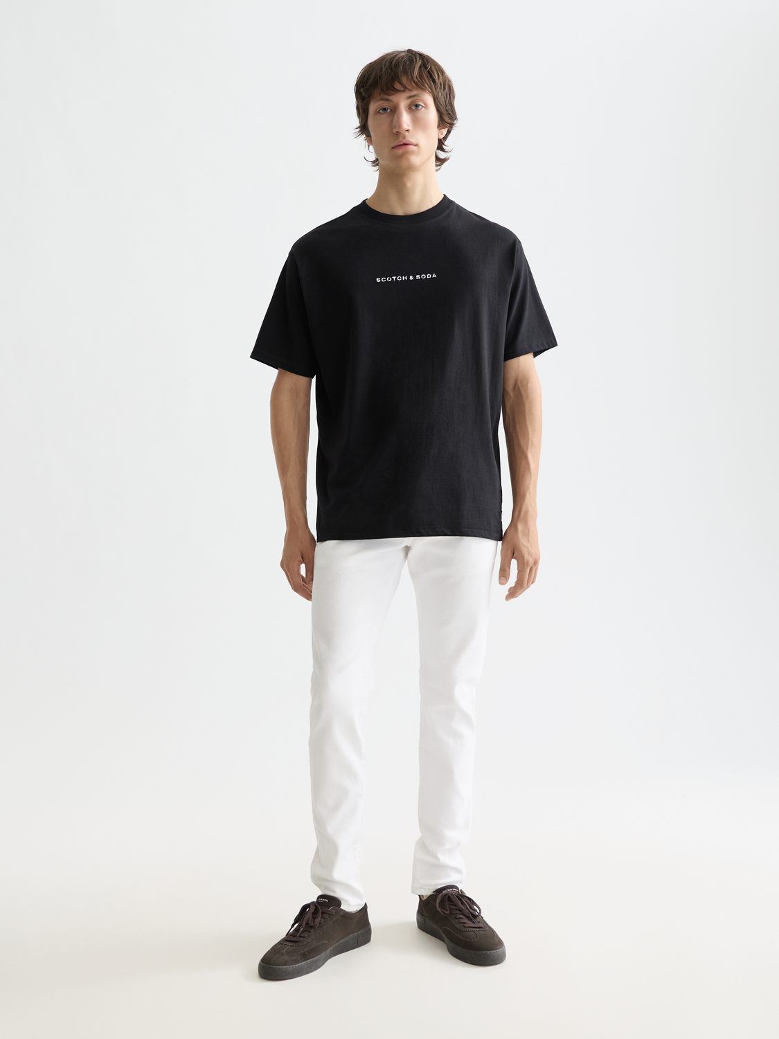 Short sleeve logo t-shirt by Scotch & Soda featuring a printed design on front, casual fit, and soft fabric material.