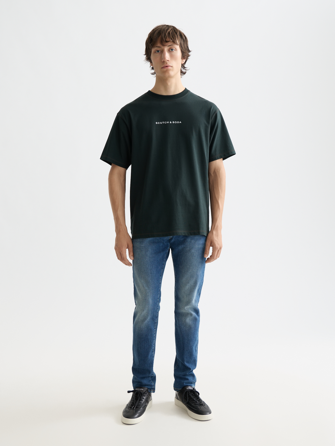 Short sleeve Scotch & Soda logo t-shirt with front graphic, casual fit, and soft cotton fabric.