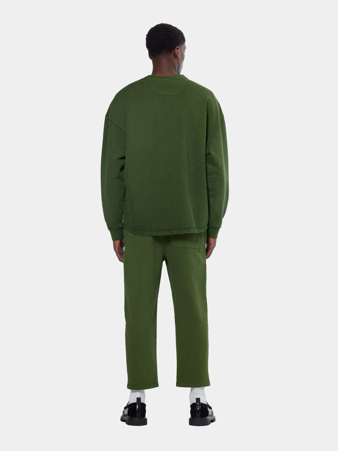 Black Scotch & Soda 3 Crosses sweatshirt featuring a casual crewneck design with embroidered cross details on the front.