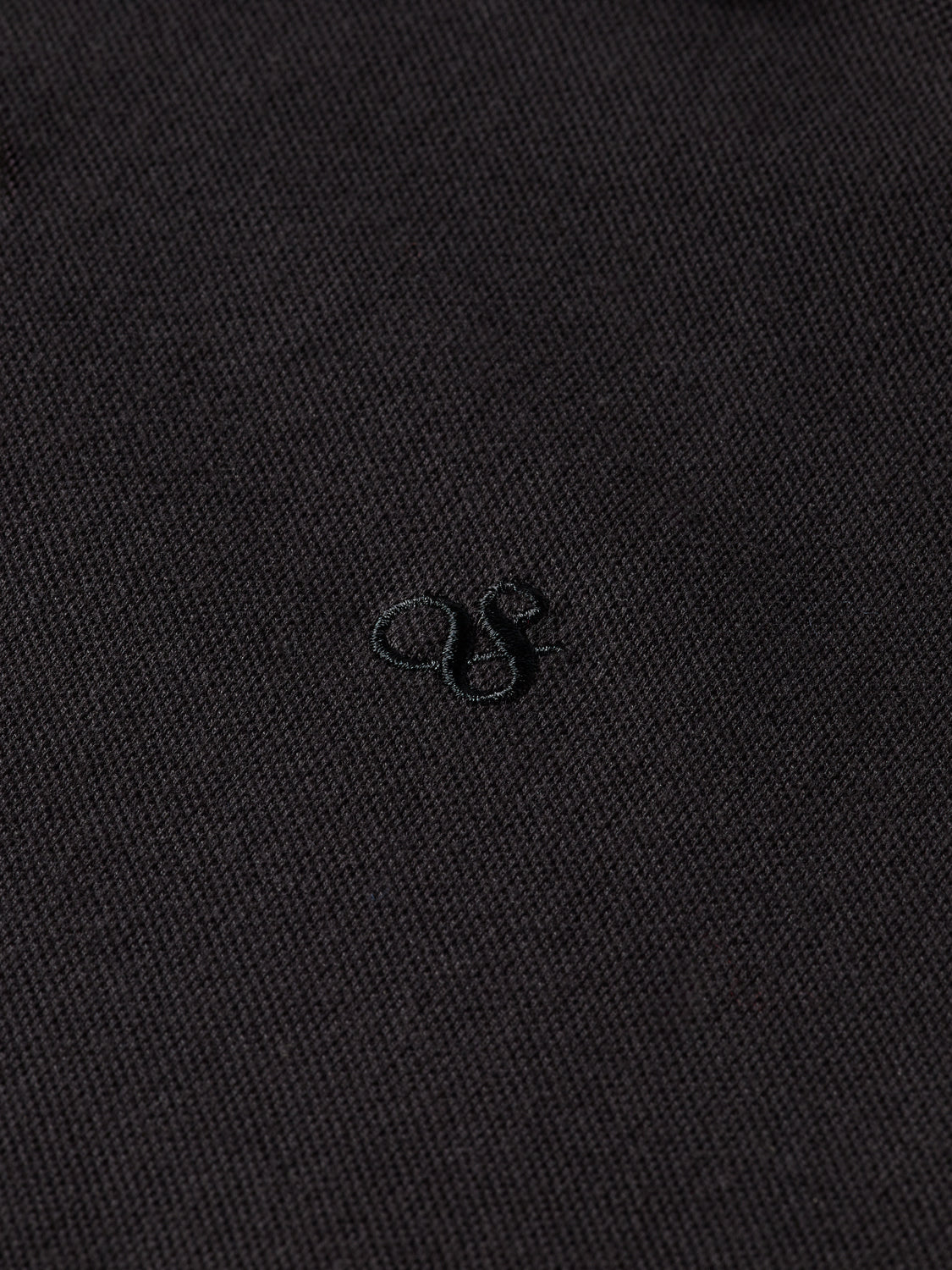 SCOTCH & SODA logo pique polo shirt in navy with a classic collar and short sleeves, displayed on a hanger.