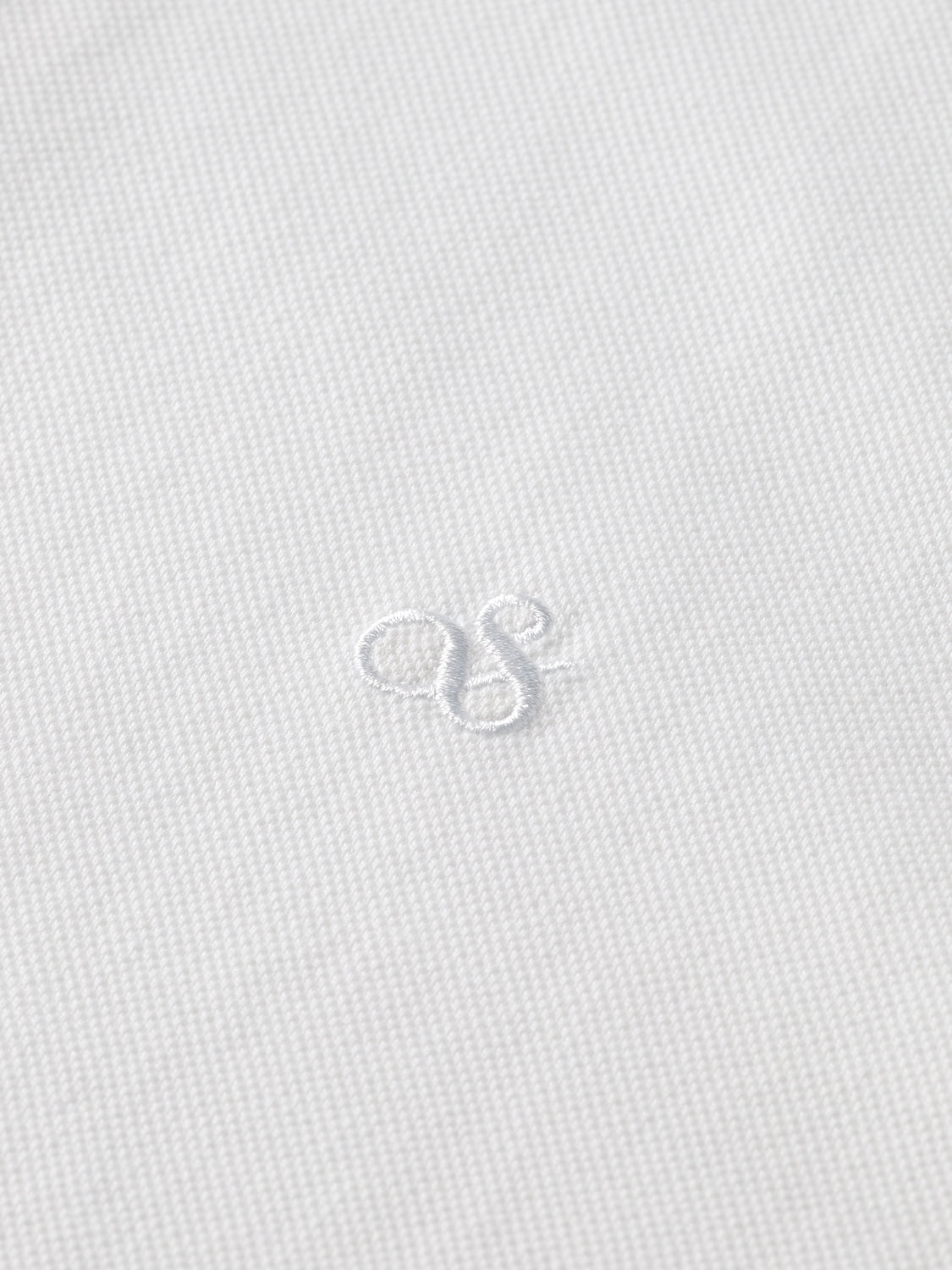 Scotch & Soda logo pique polo shirt in navy with short sleeves and collar, featuring a classic polo design and branding detail.