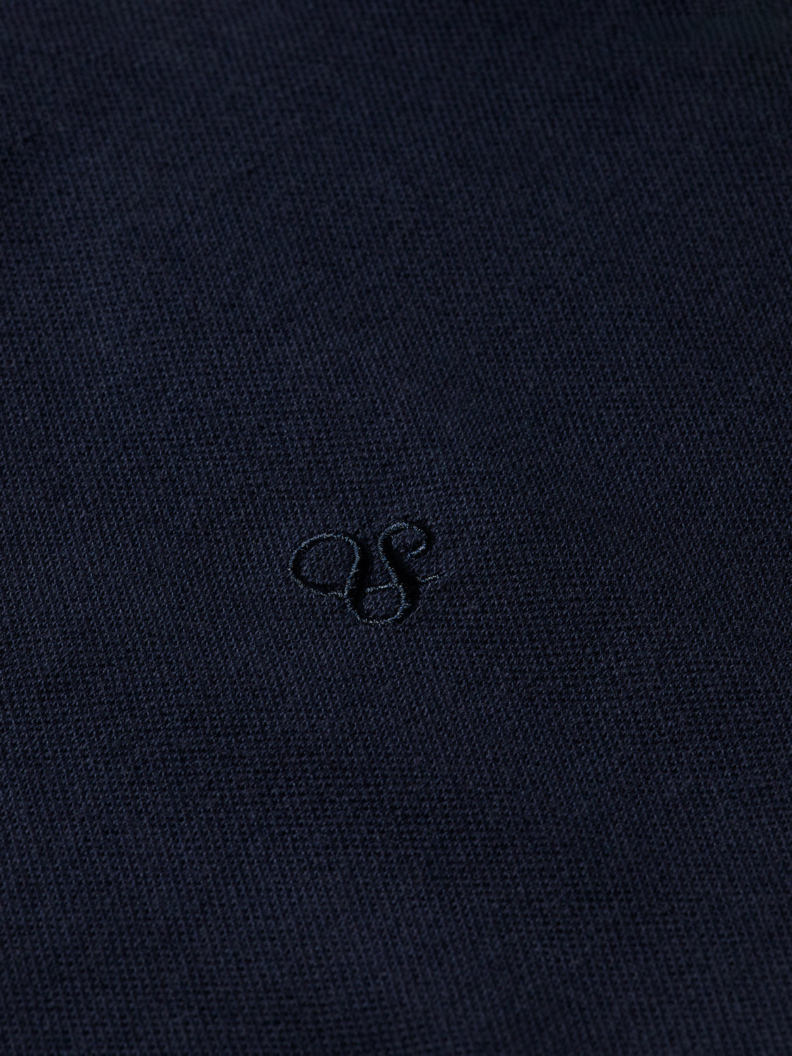 Scotch & Soda logo pique polo shirt with a classic collar and short sleeves, featuring a subtle embroidered logo on the chest.