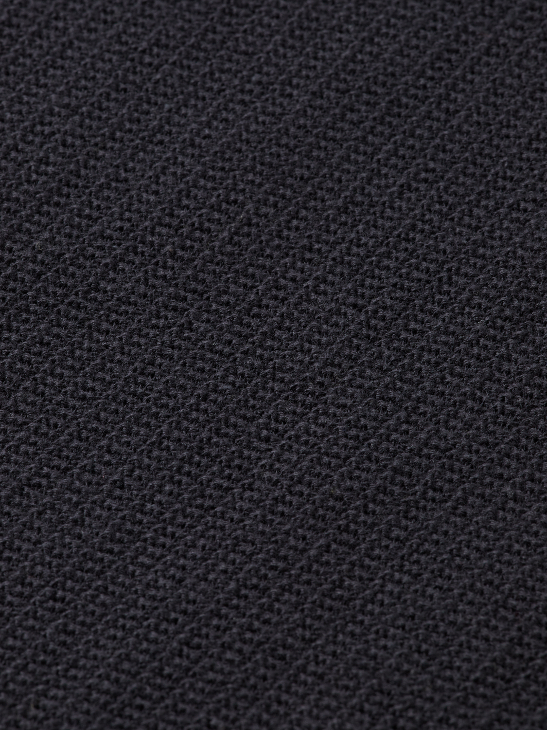 Blue knitted polo shirt by Scotch & Soda, featuring a classic collar and textured knit fabric.