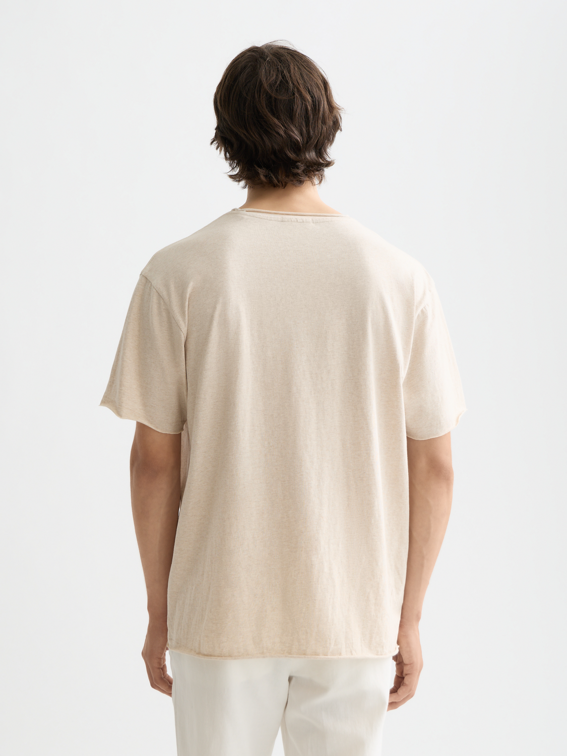 Raw-edged S/S T-shirt by Scotch & Soda, shown from the back with a relaxed fit and casual style.