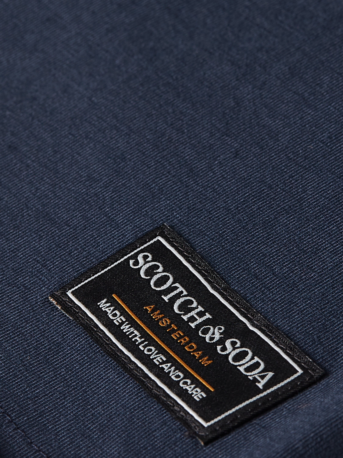 Raw-edged SCOTCH & SODA short sleeve t-shirt, casual style, shown in a natural fit with a relaxed look.