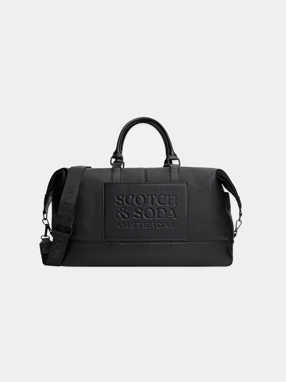 SCOTCH & SODA weekender bag in dark fabric with leather accents, featuring sturdy handles and spacious main compartment.
