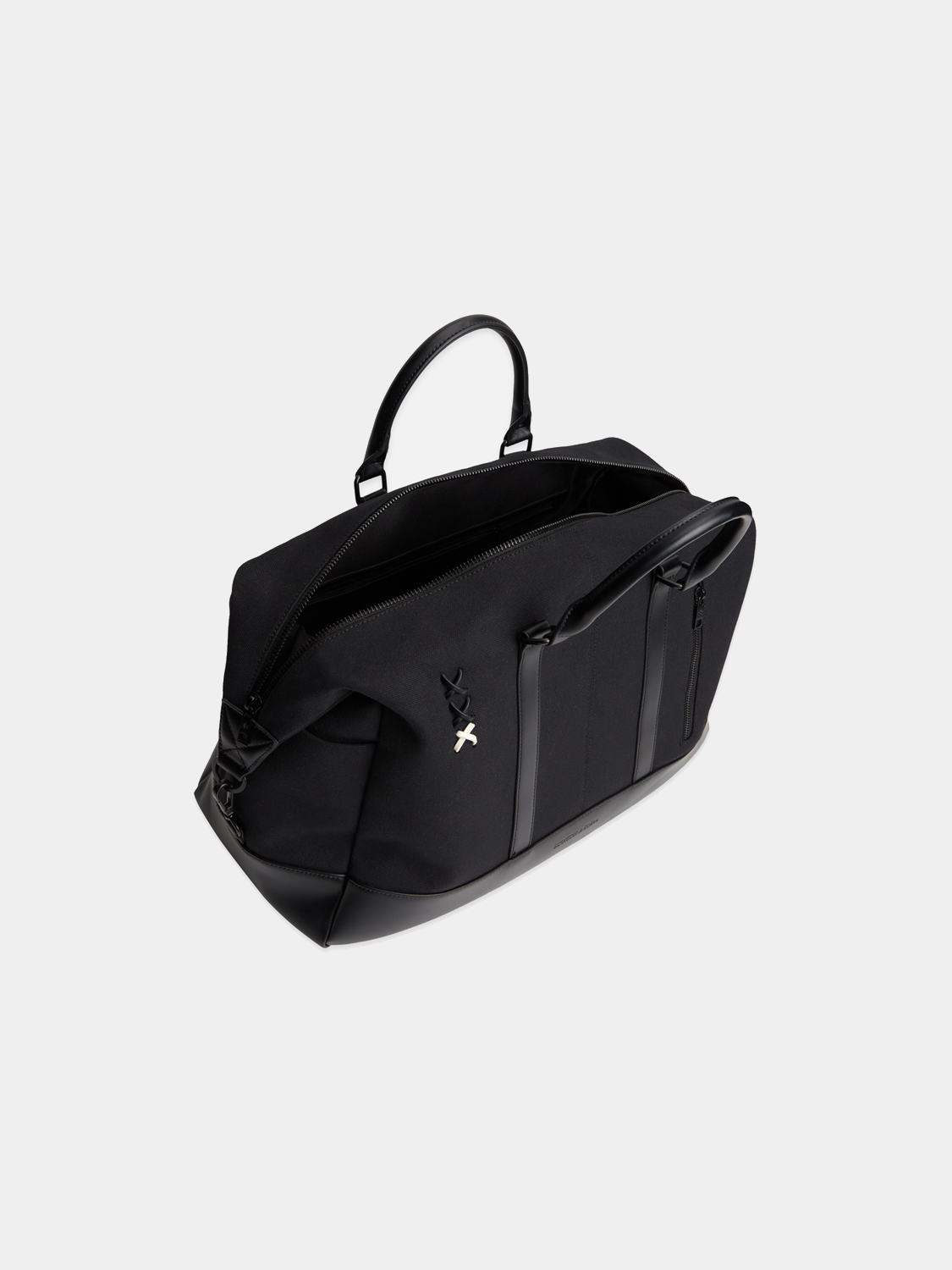 Canvas weekender bag by Scotch & Soda with sturdy handles, spacious interior, and minimalist design for travel and weekend trips.