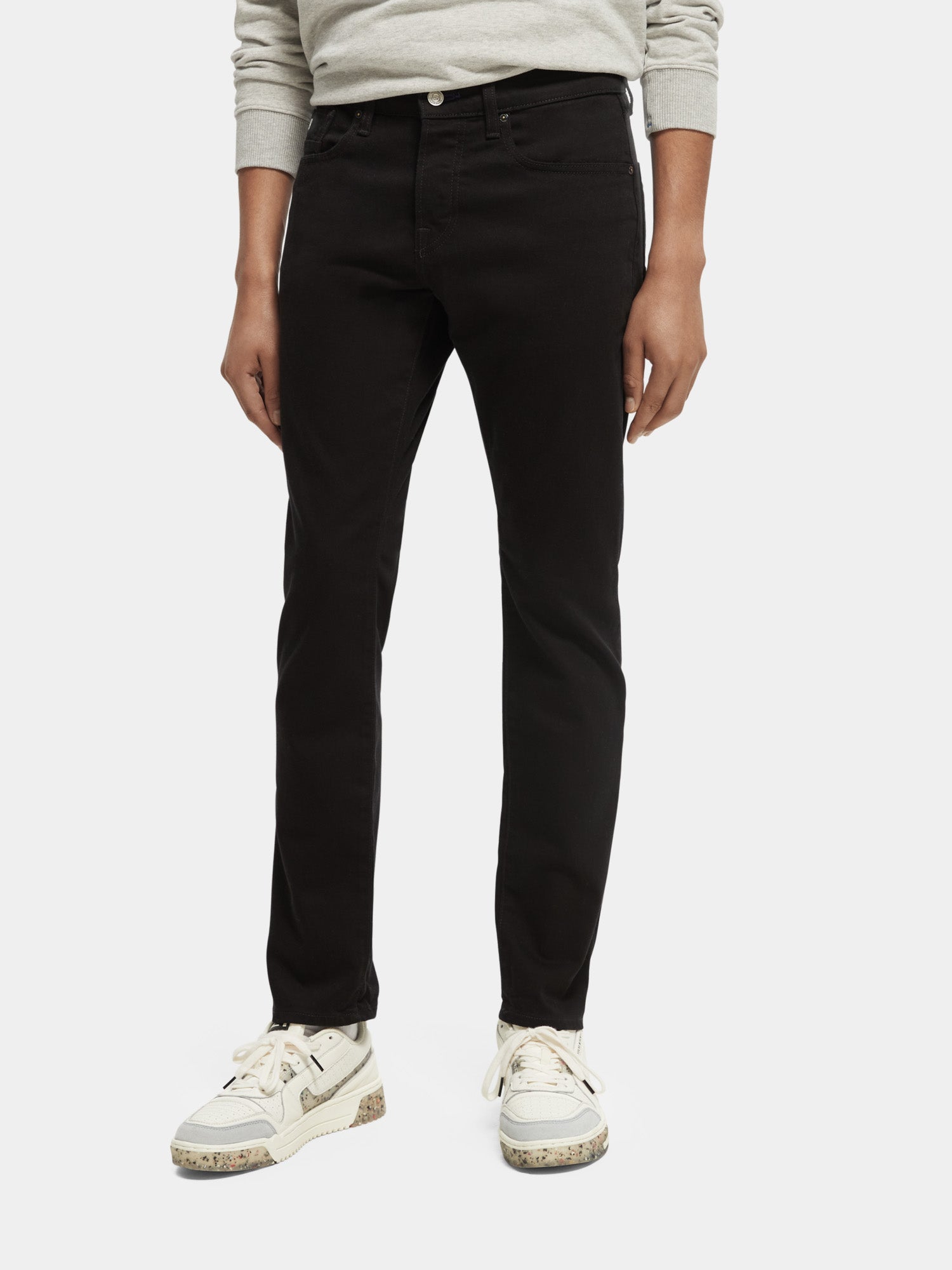 Scotch & Soda Ralston slim fit denim jeans in dark wash, showing front view with classic five-pocket design.