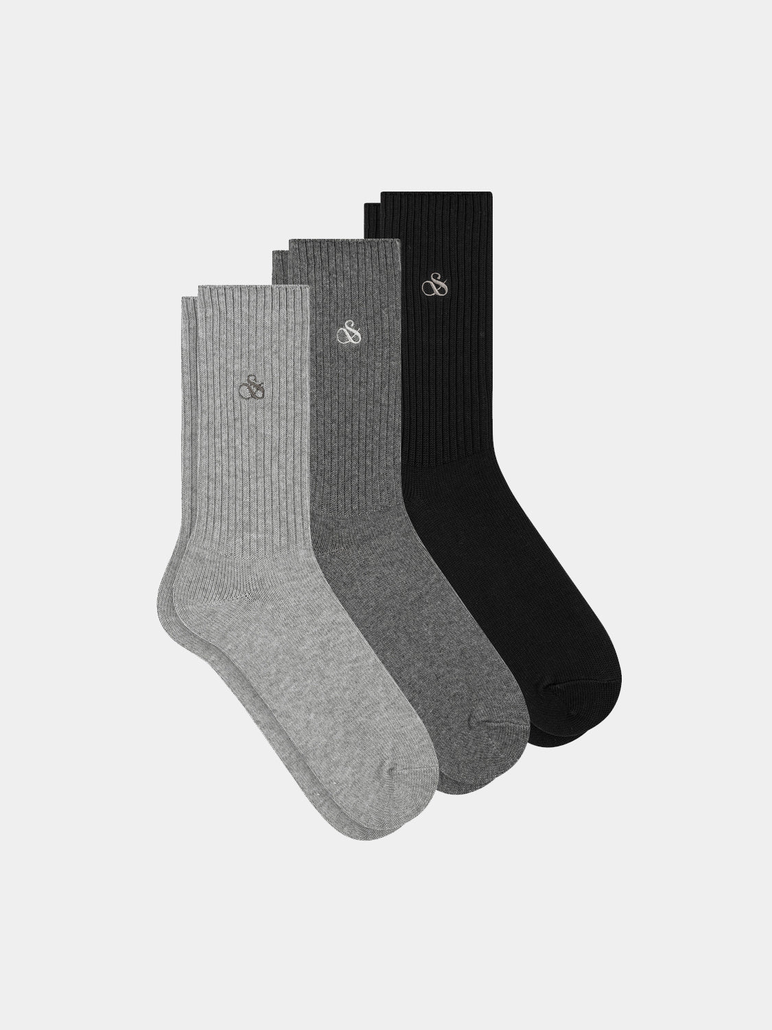 Three pairs of SCOTCH & SODA crew socks in various colors, soft fabric, and classic design, displayed together.