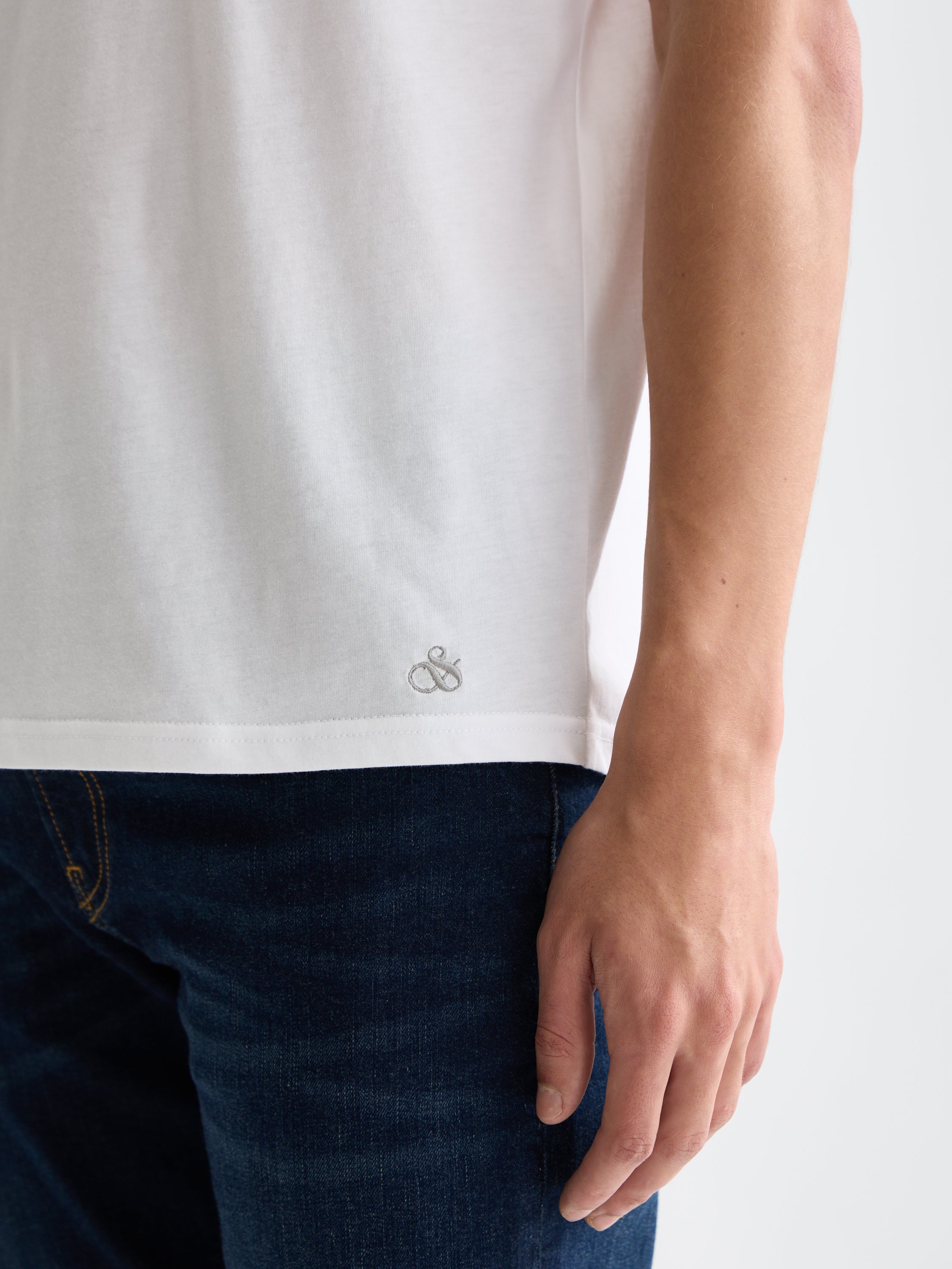 Three SCOTCH & SODA short-sleeve v-neck t-shirts in neutral colors, displayed flat on a white background.