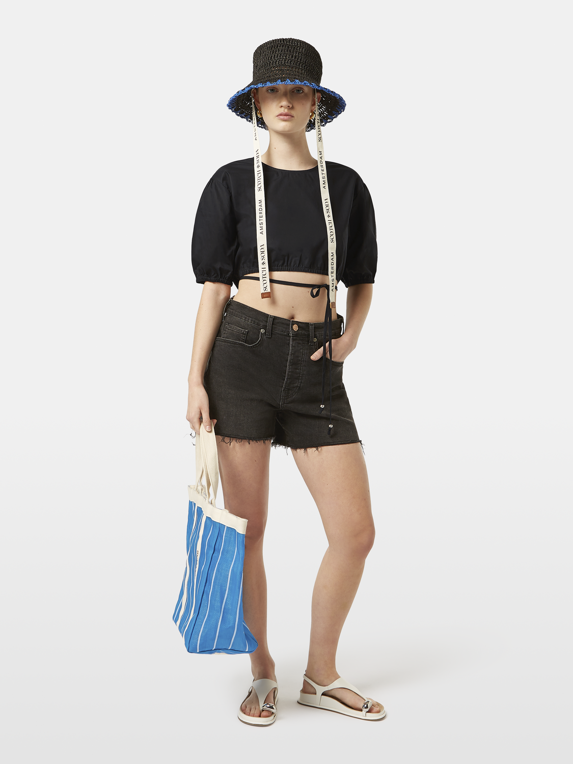 Light blue cropped poplin top by Scotch & Soda featuring a woven fabric design and short sleeves.