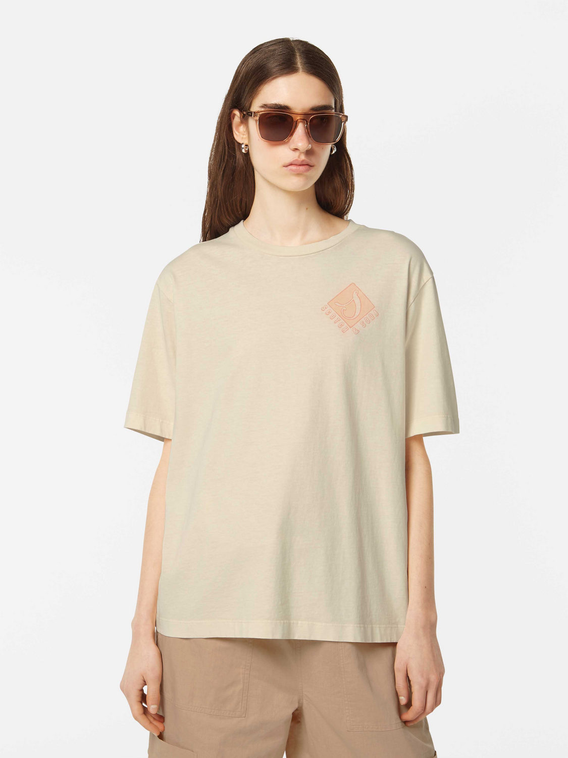 Light blue Scotch & Soda short-sleeve garment-dyed t-shirt displayed flat with visible crew neckline and soft fabric texture.