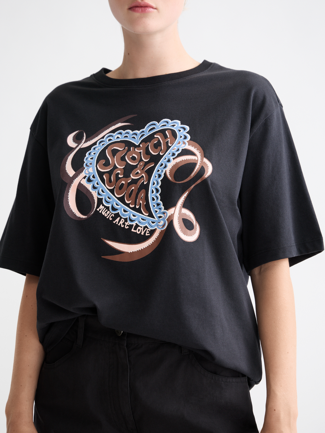 Short-sleeve Scotch & Soda artwork T-shirt featuring a colorful, artistic print on soft fabric.