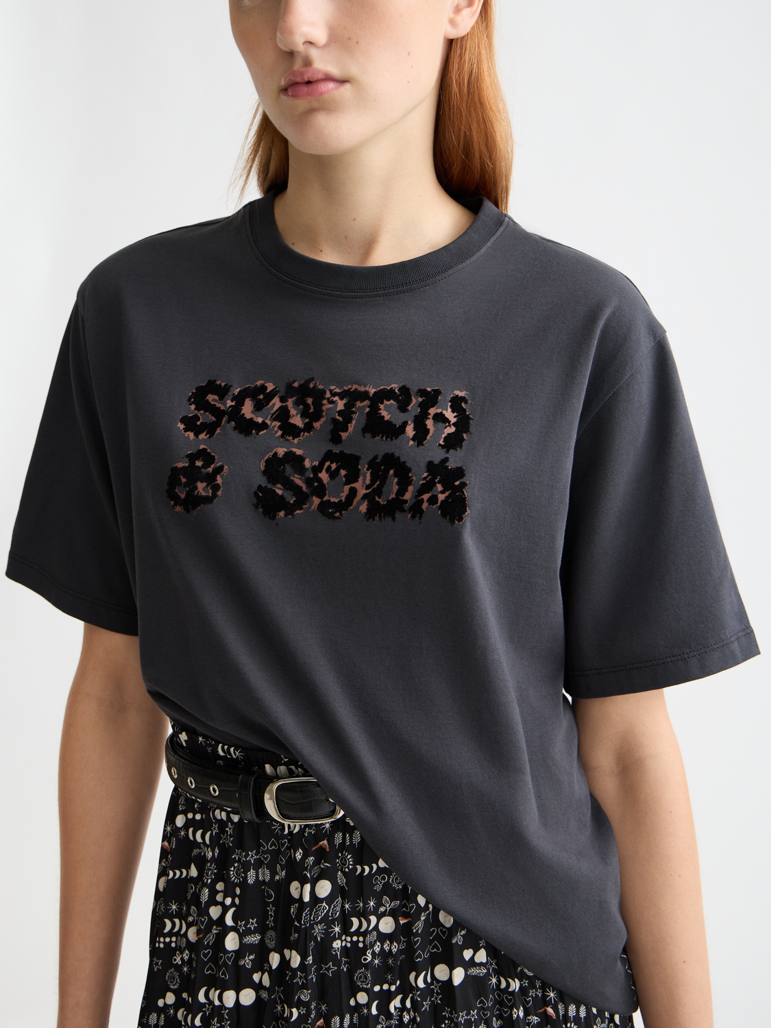 Short sleeve Scotch & Soda artwork T-shirt featuring colorful graphic print on soft cotton fabric.
