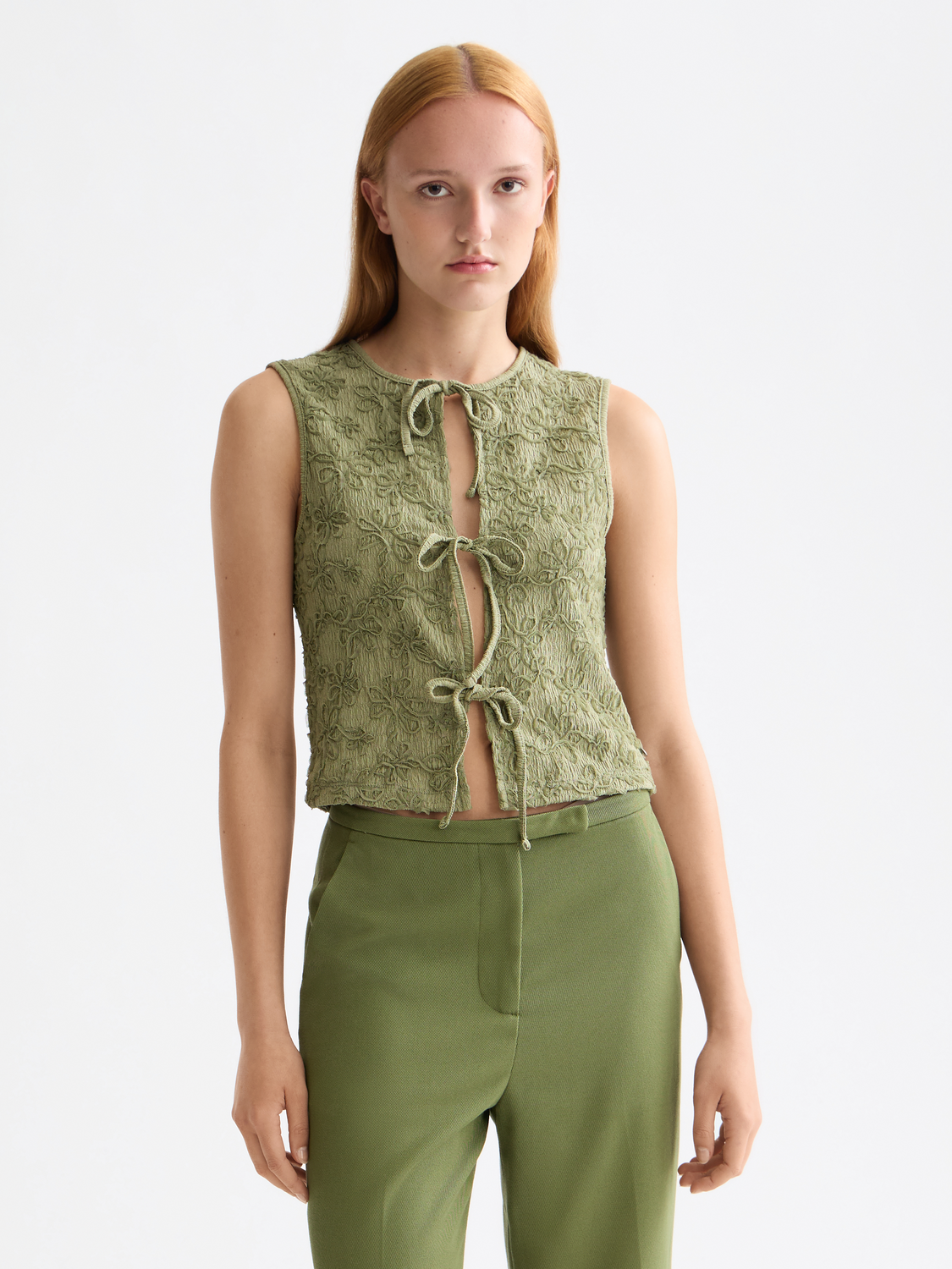 Structured tank top with bow closure from Scotch & Soda, featuring a fitted design and sleeveless style.