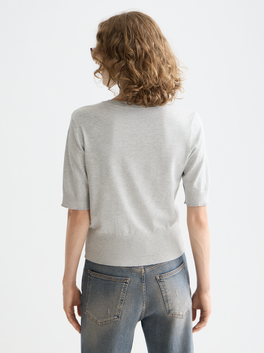 Short-sleeved knit pullover top by Scotch & Soda, featuring a cozy, textured design in a versatile style and color.
