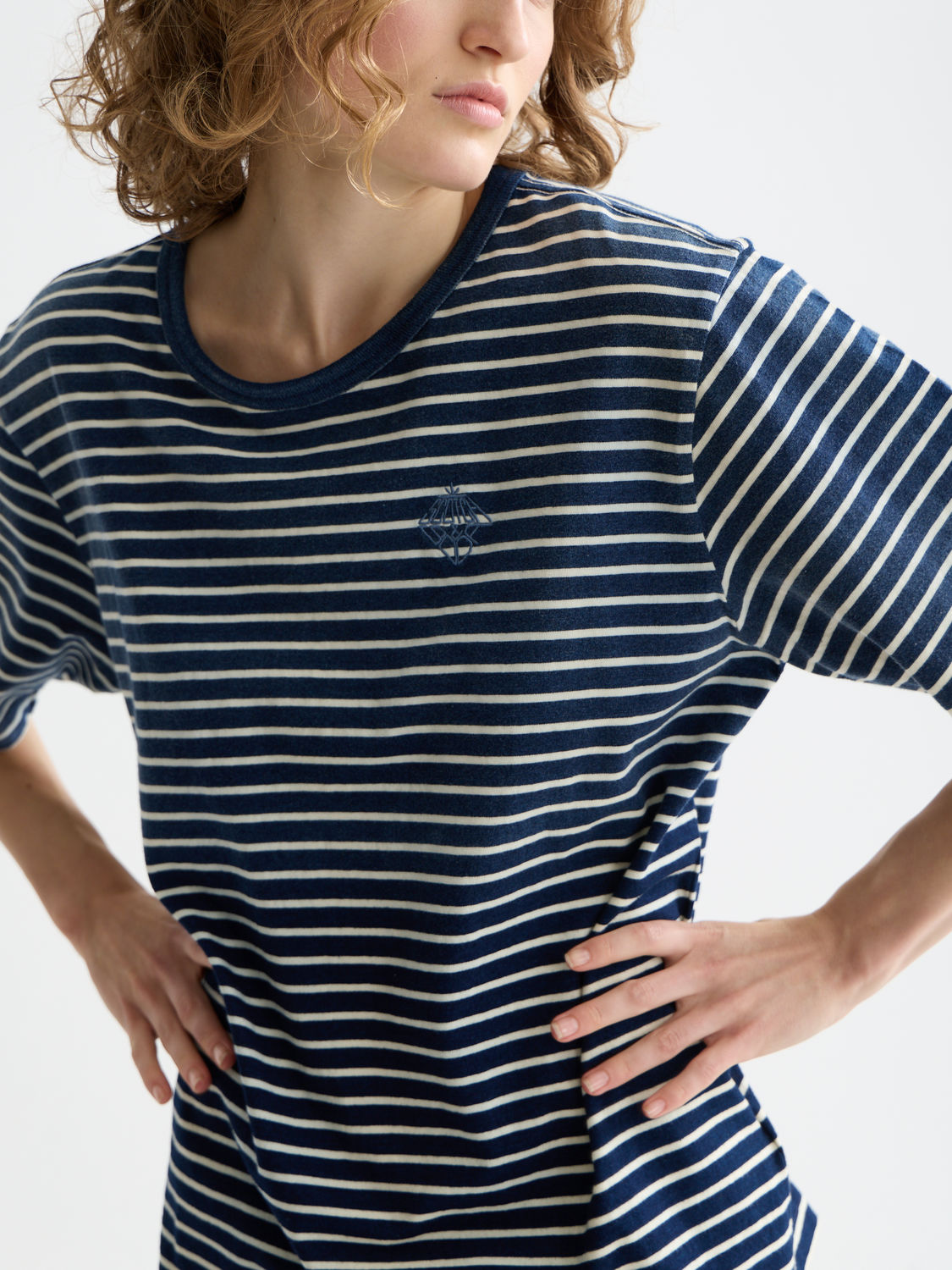 Indigo washed Scotch & Soda short-sleeve T-shirt with a casual fit and soft fabric, displayed on a plain background.