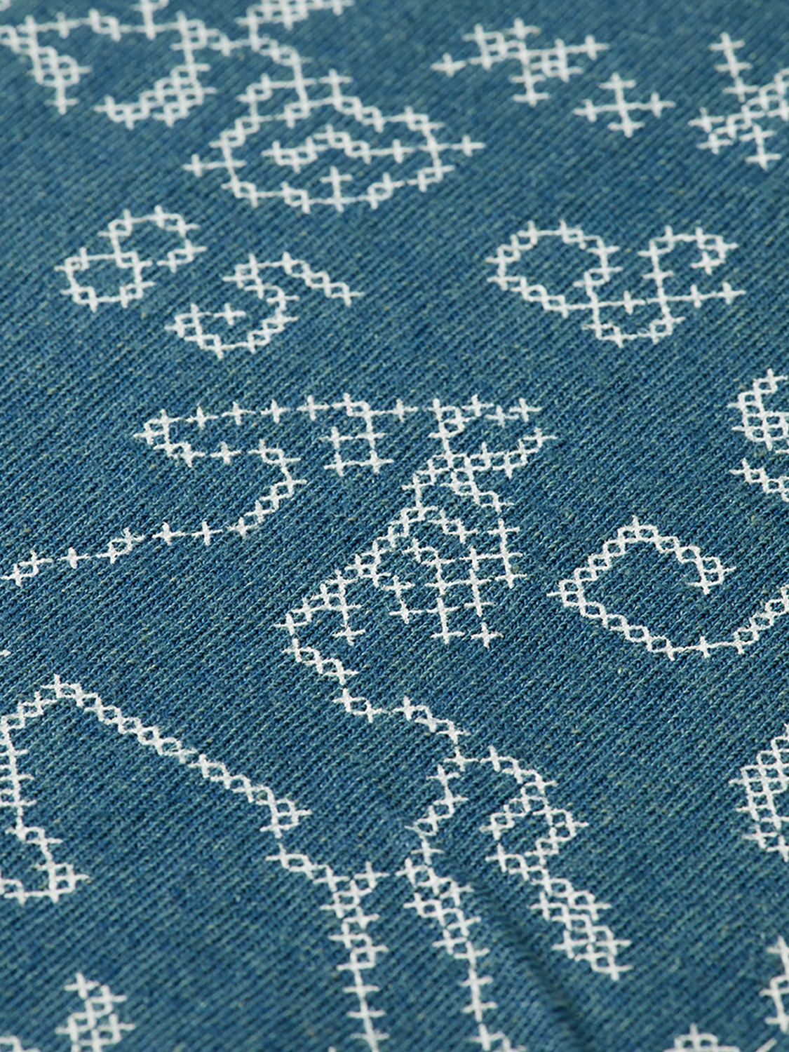 Light blue Scotch & Soda graphic T-shirt with short sleeves and bold printed design on front.