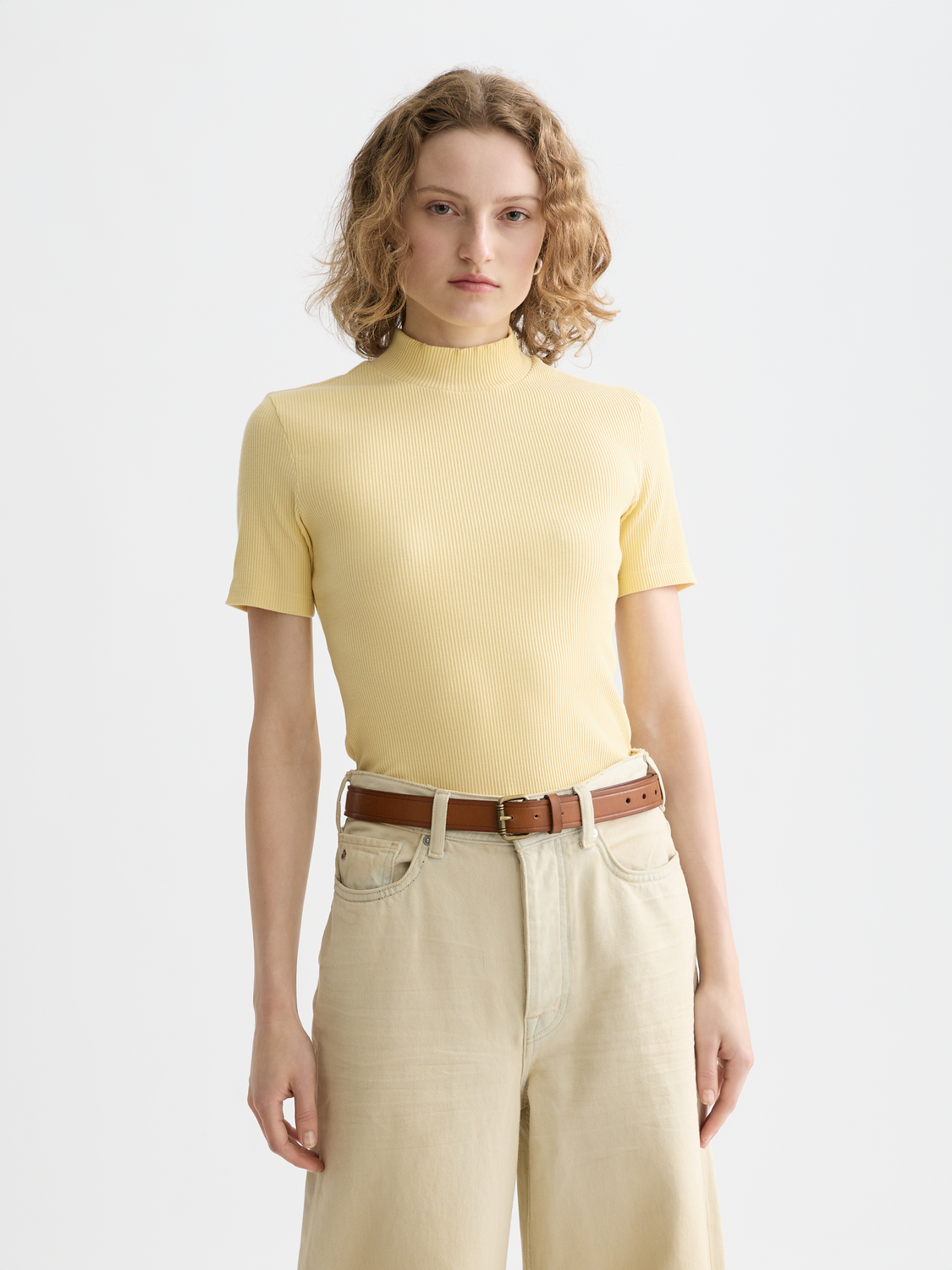 Light blue Scotch & Soda short-sleeve mock neck rib top with fitted design, displayed on a model.
