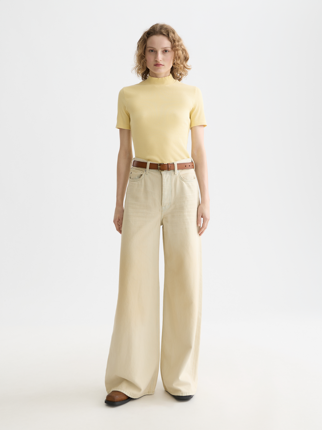 Light beige Scotch & Soda mock neck rib top, short-sleeve tee with fitted silhouette and textured ribbed fabric.