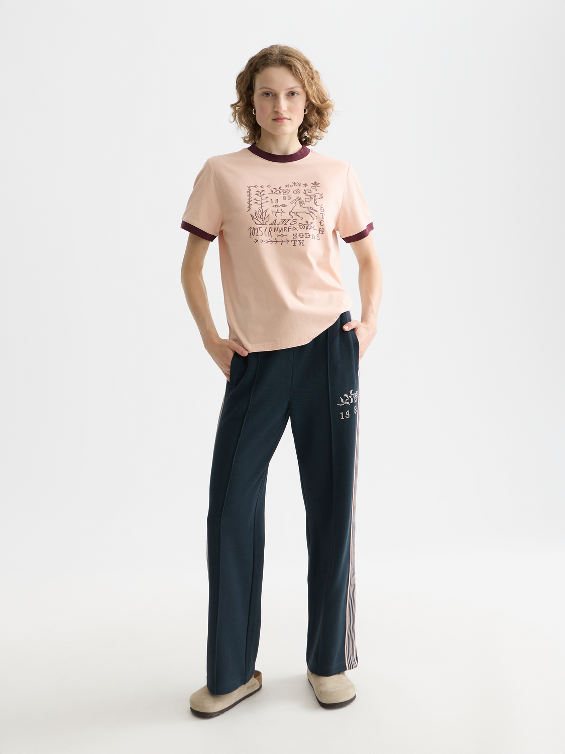 Embroidered Scotch & Soda short-sleeve ringer t-shirt with colorful floral embroidery on front and contrasting neckline.
