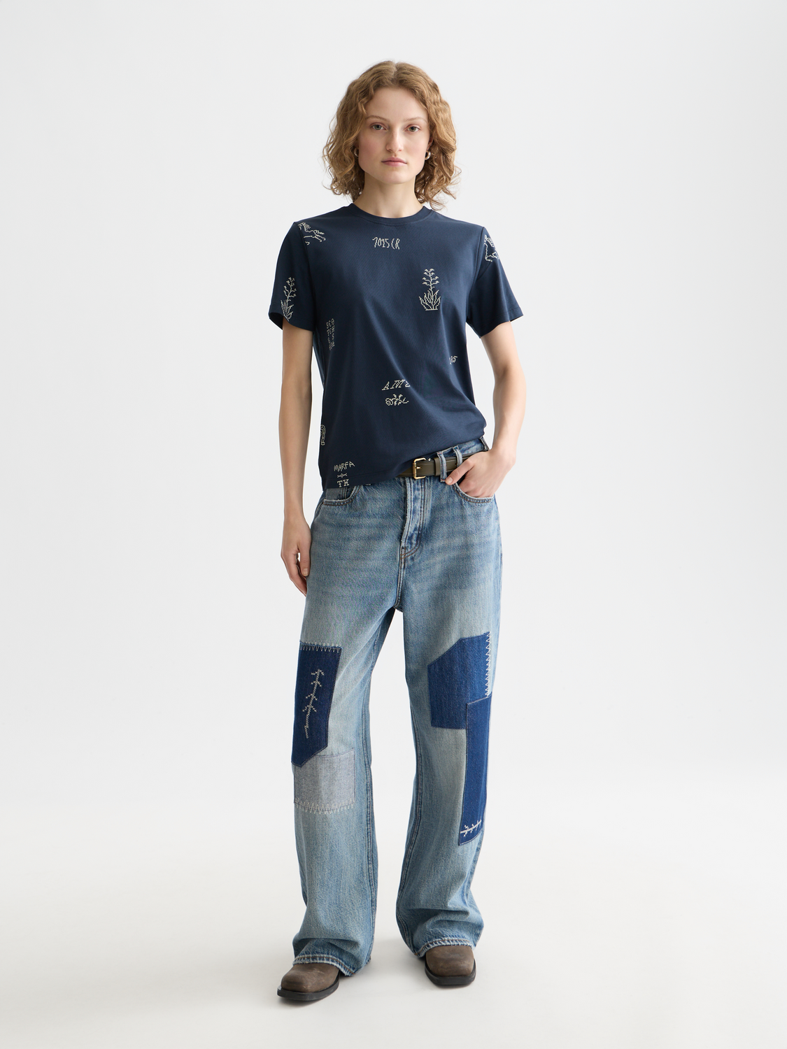 Printed Scotch & Soda short-sleeve t-shirt featuring a colorful graphic design on the front.