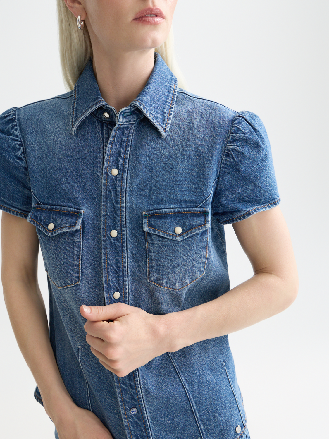 Light blue fitted denim shirt from Scotch & Soda, short-sleeve design, with button-up front and classic collar.