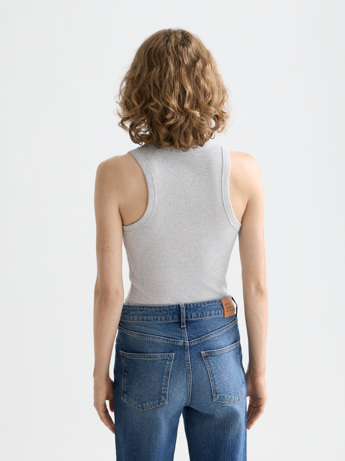 Ribbed racer tank top by Scotch & Soda, featuring a fitted design and back detail, ideal for casual summer wear.