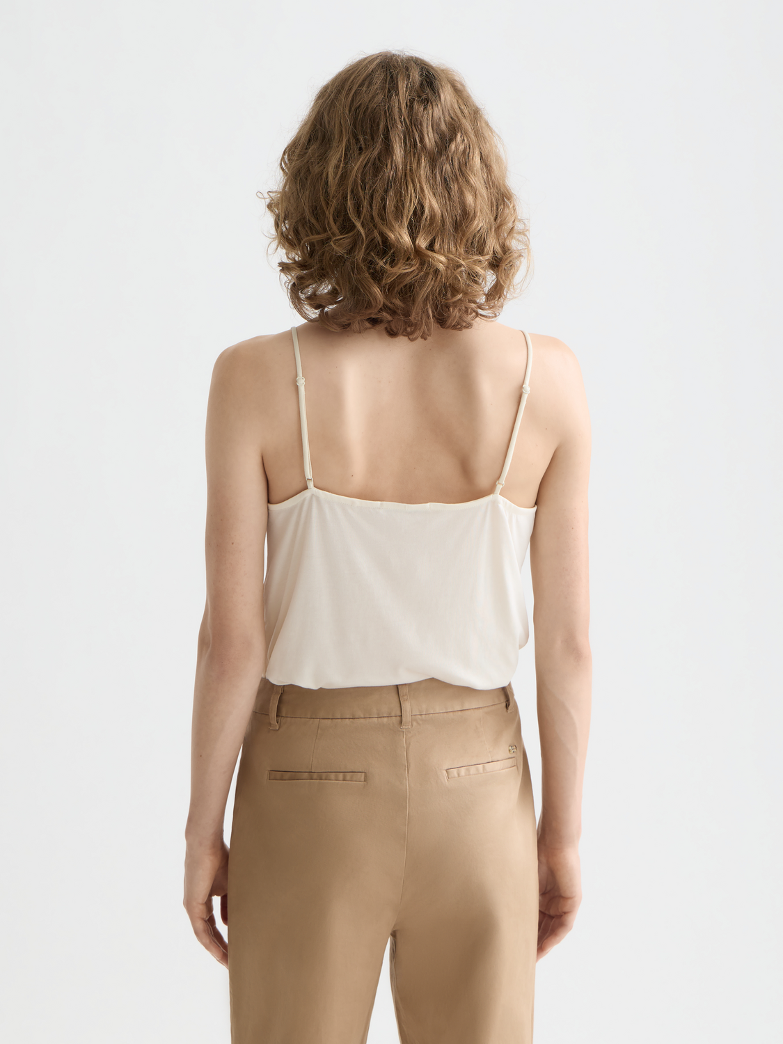 Woven jersey tank top by Scotch & Soda, showing the back view with a relaxed fit and natural fabric texture.