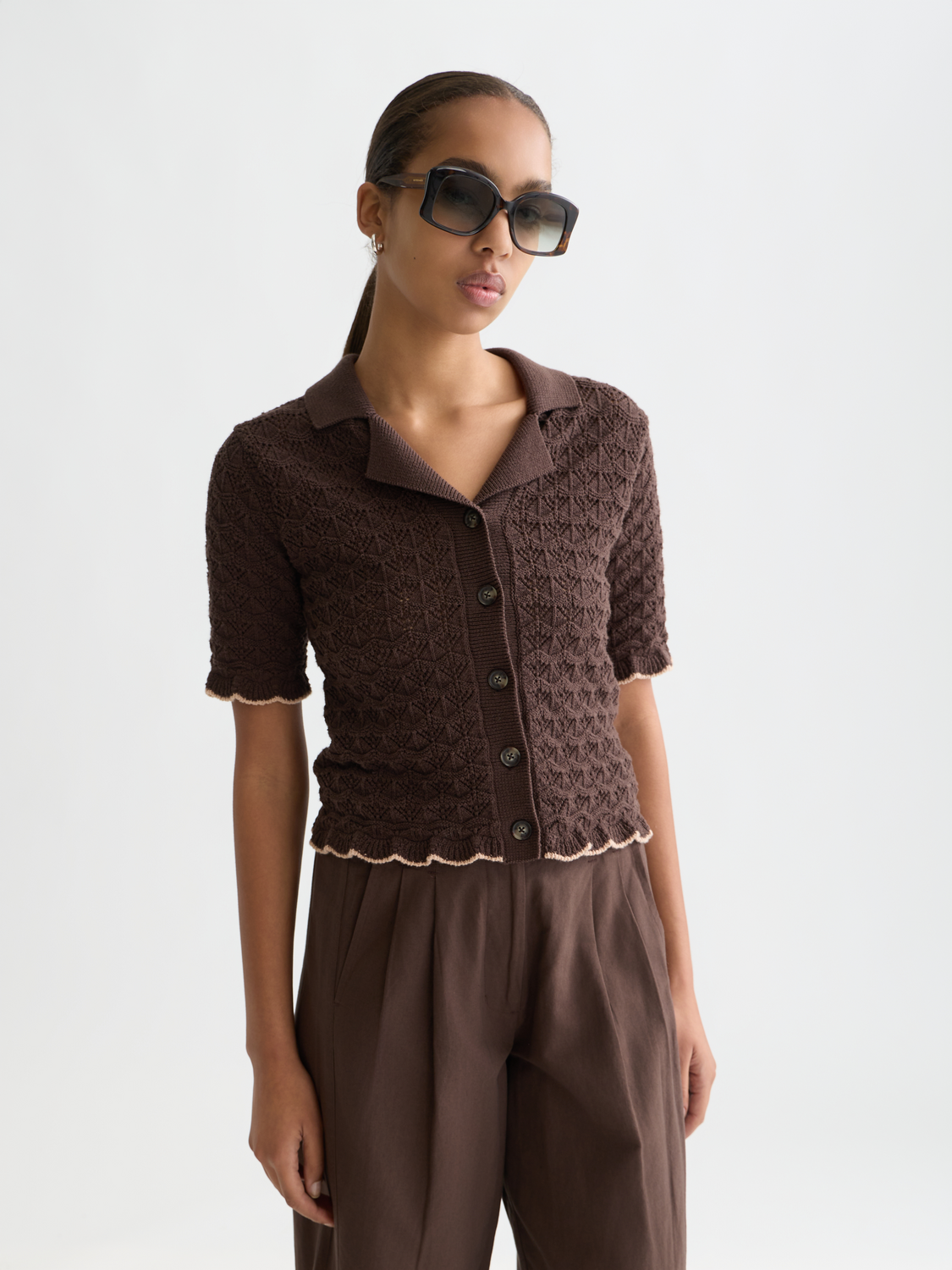 Pointelle short-sleeved cardigan by Scotch & Soda, featuring delicate knitwear with a subtle pattern and a classic crew neckline.