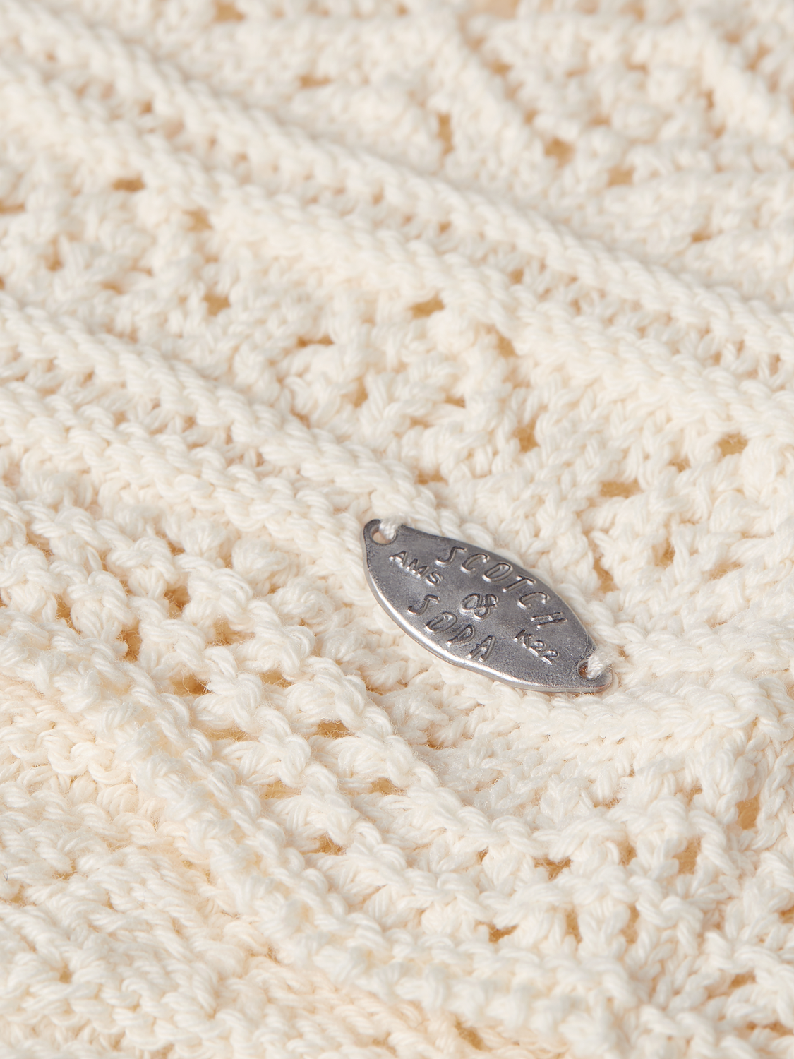 Pointelle knitted vest tank top by Scotch & Soda, featuring a delicate, breathable design with a soft, textured fabric.