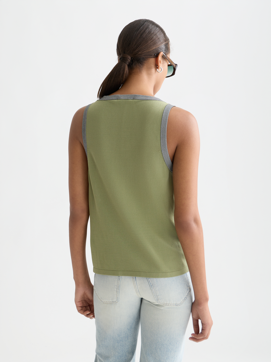 Striped knitted tank vest by Scotch & Soda with a close-up back view, showcasing its textured knit and vibrant stripe pattern.