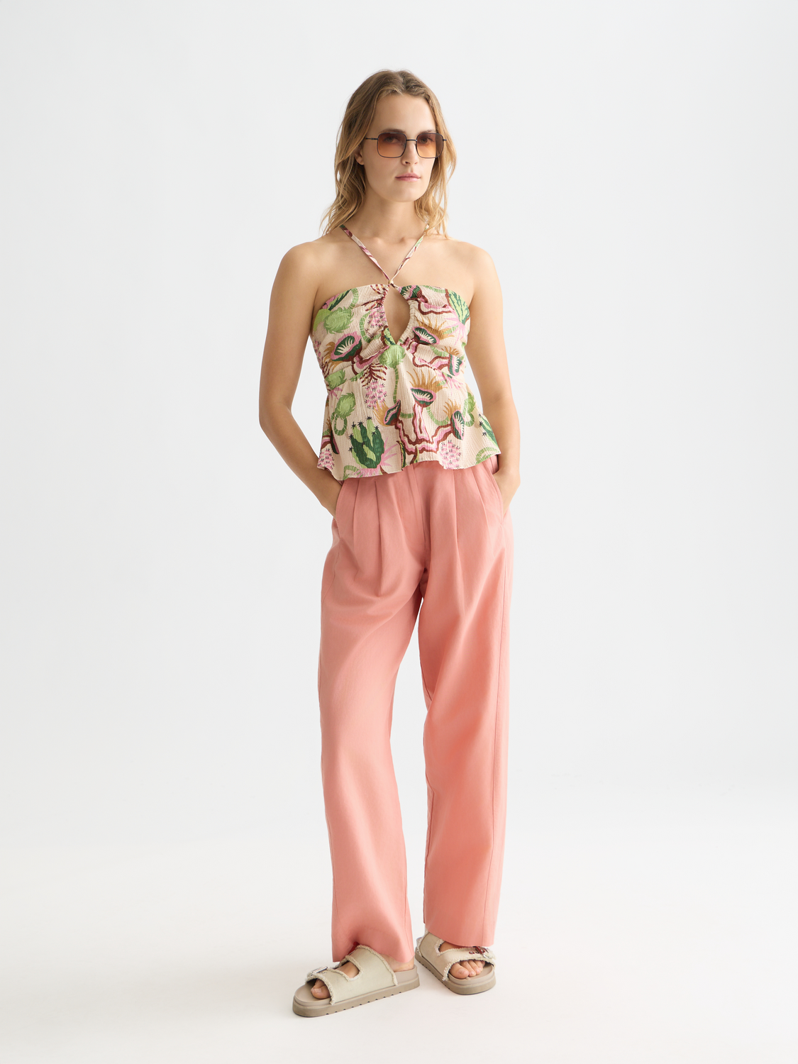 Seersucker halter tank top from Scotch & Soda with striped fabric and fitted design, displayed on a model.