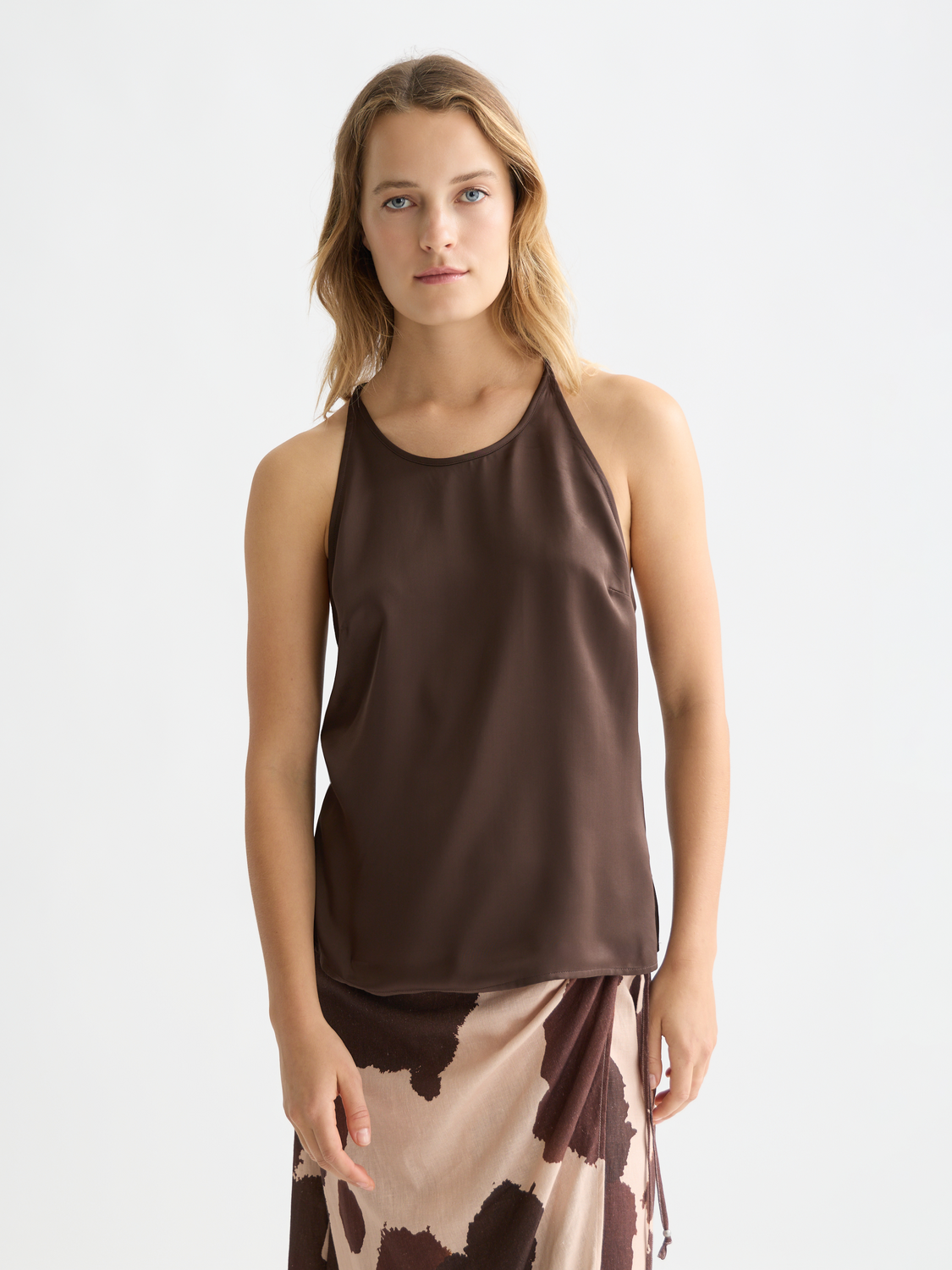 Blue SCOTCH & SODA halter tank top with adjustable straps and floral pattern, displayed on a mannequin.