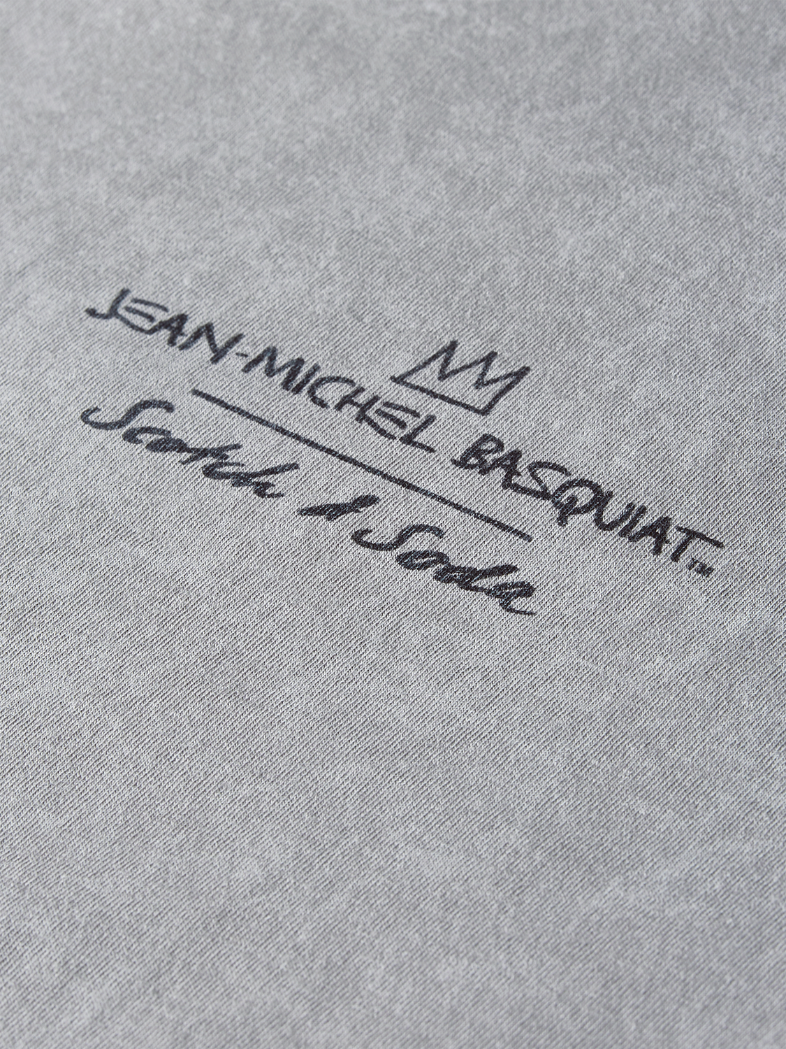 Short sleeve T-shirt by Scotch & SODA featuring a bold Basquiat artwork design on the front.