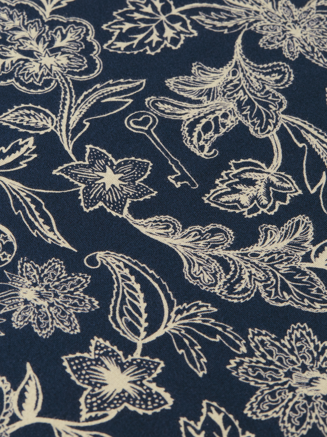 Printed SCOTCH & SODA short-sleeve T-shirt with colorful graphic design on white fabric.